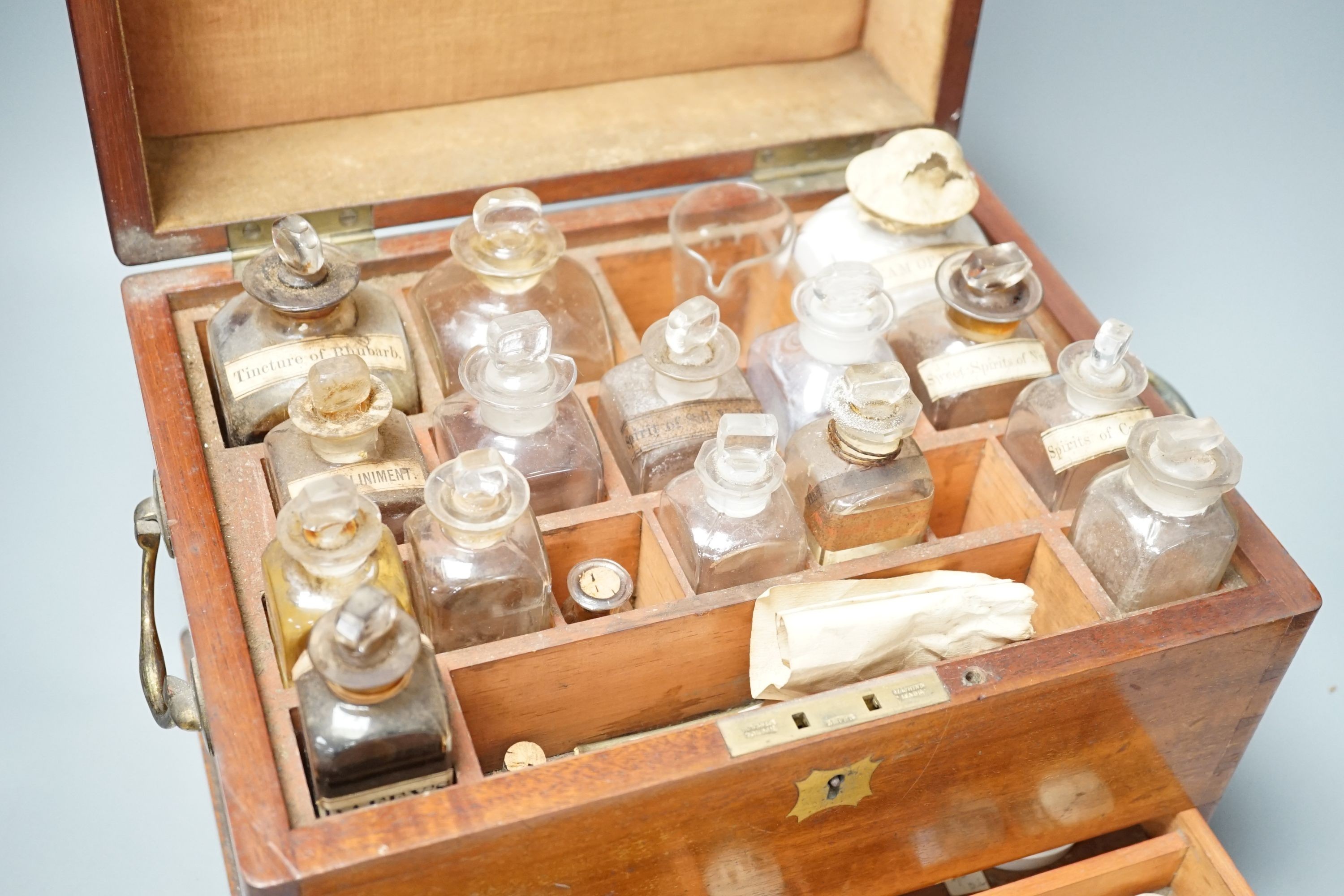 A Victorian mahogany apothecary box and contents, 32 cm wide